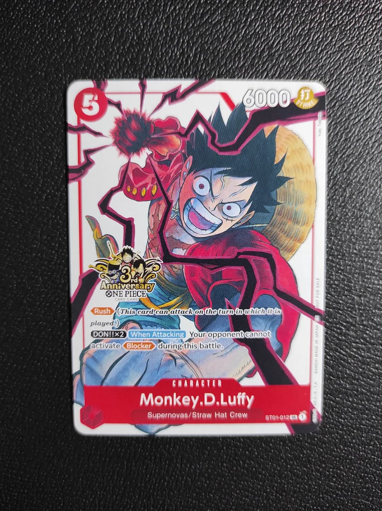 ST01-012 | Monkey D Luffy Black Clover 3rd Anniversary gambar 1